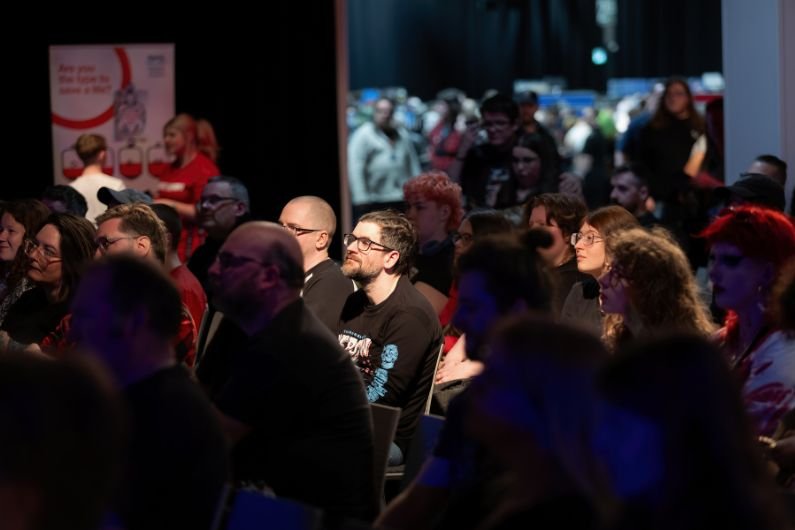 People watching a panel